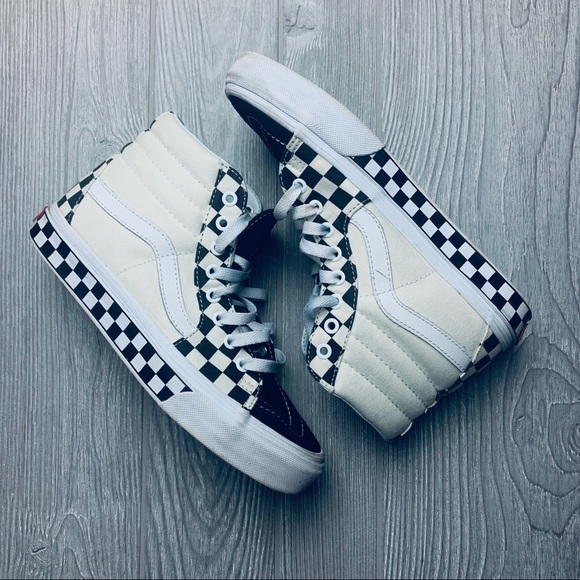 light blue vans with checkers on the side